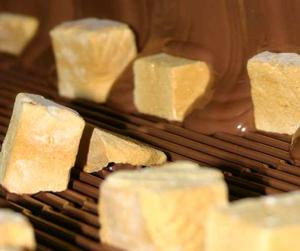 Robern Menz's new chocolate refining machines will boost chocolate production while cutting back on energy consumption and costs.